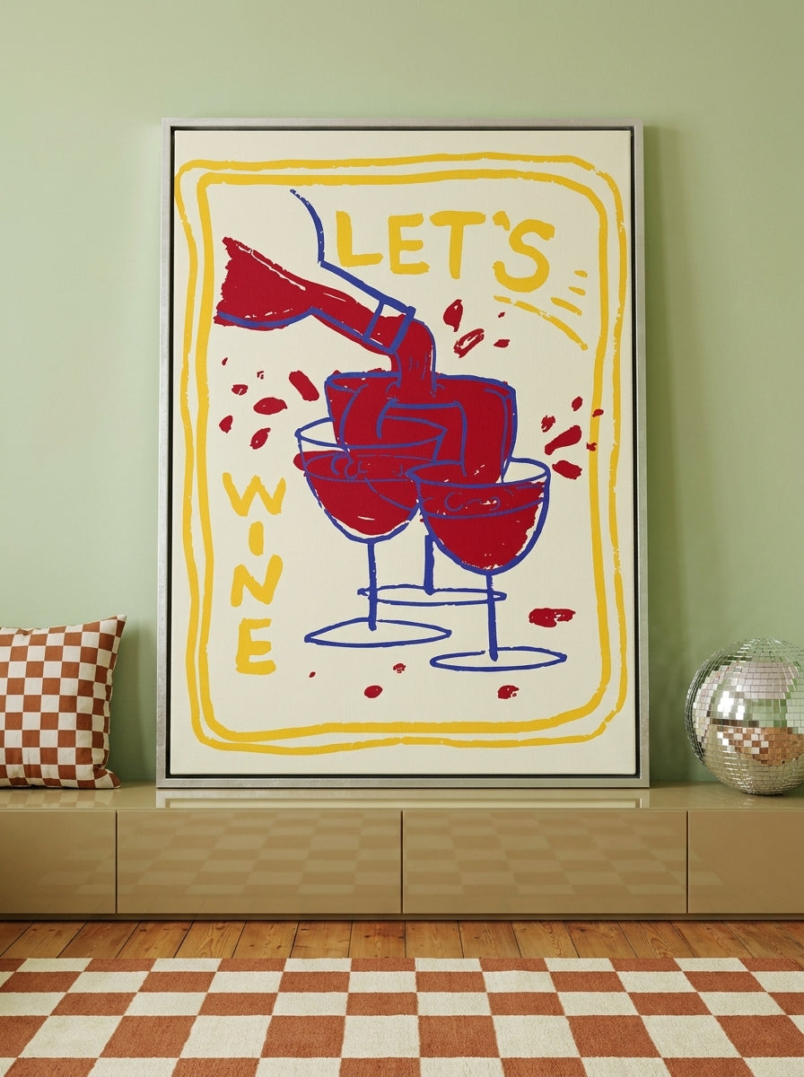 Canvas wall art with a silver leaf surround standing on a sideboard in a colourful eclectic living room