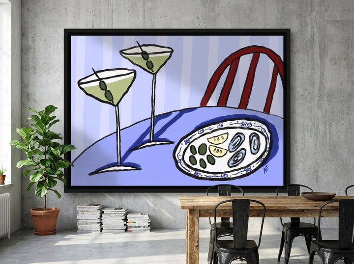 Canvas wall art with a black surround styled on the wall in an industrial loft dining room