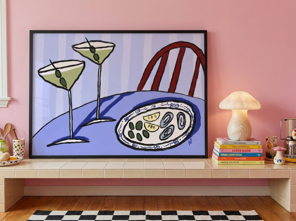 Modern wall art print standing on a kitchen bench in a colourful eclectic kitchen