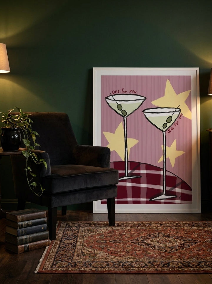 Modern wall art print leaning against the wall in a moody dining room
