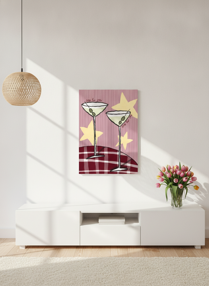 Stretched canvas wall art styled on the wall in a bright Scandinavian living room