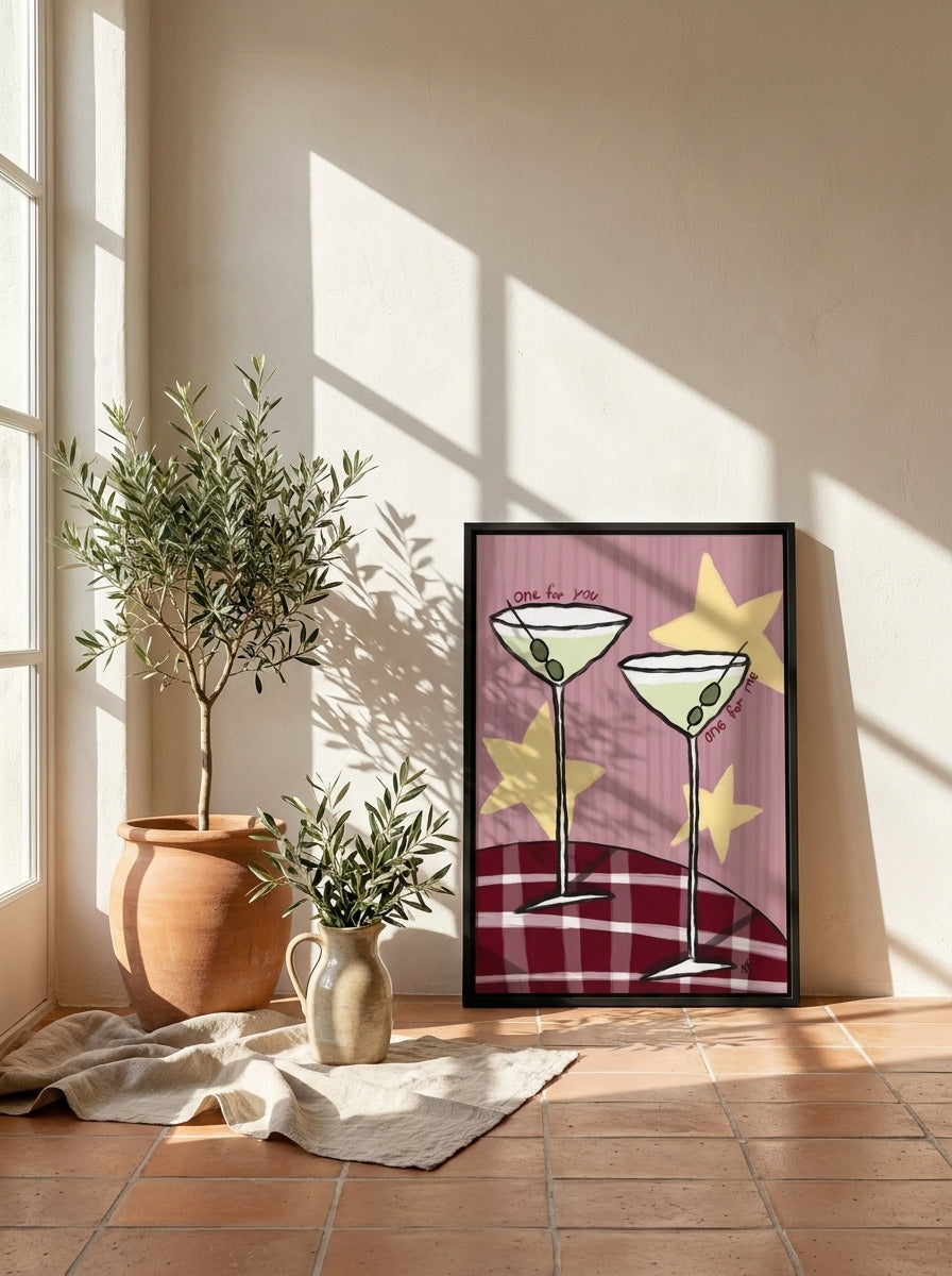Canvas wall art with a black surround leaning against the wall in a Mediterranean kitchen