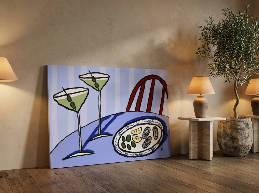 Stretched canvas wall art leaning against the wall in a luxe living room