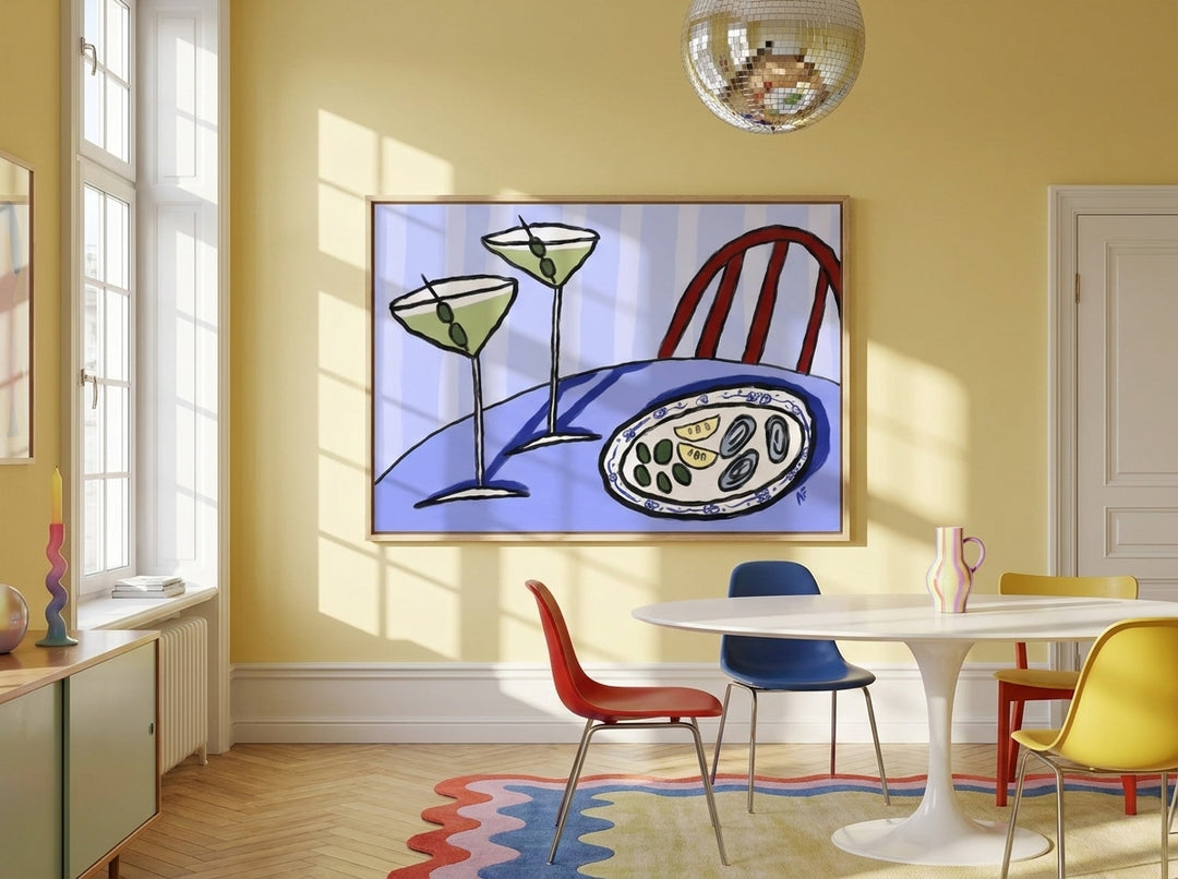Oversized statement canvas wall art with a natural timber surround styled on the wall in a colourful eclectic dining room