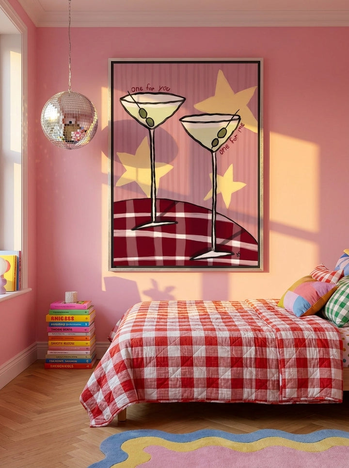 Canvas wall art with a silver leaf surround styled on the wall in a colourful eclectic bedroom