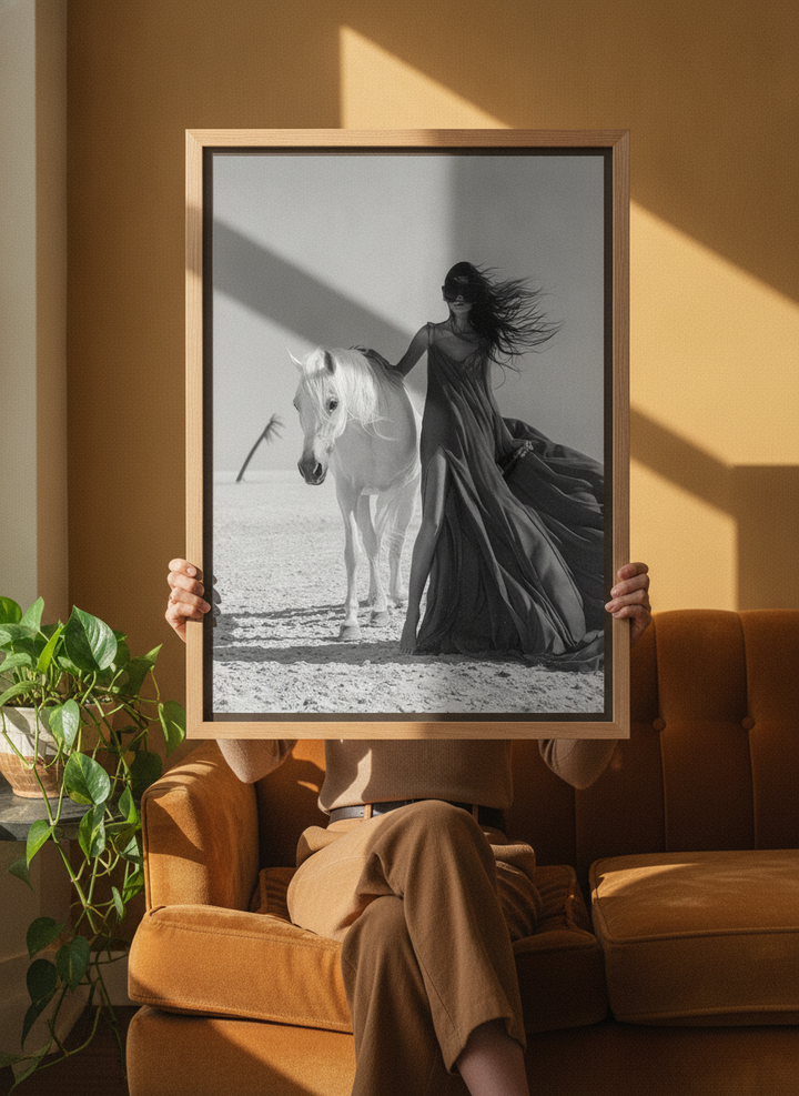 Person holding canvas wall art with a natural timber surround in a retro 70s living room