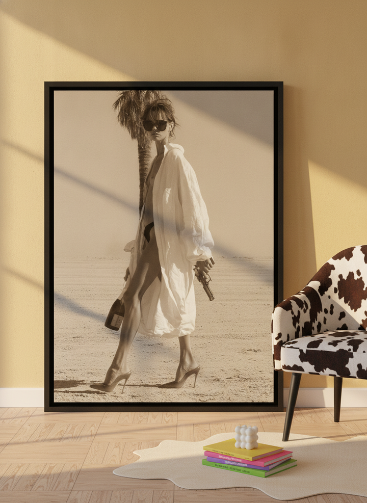 Canvas wall art with a black surround leaning against the wall in a colourful eclectic bedroom