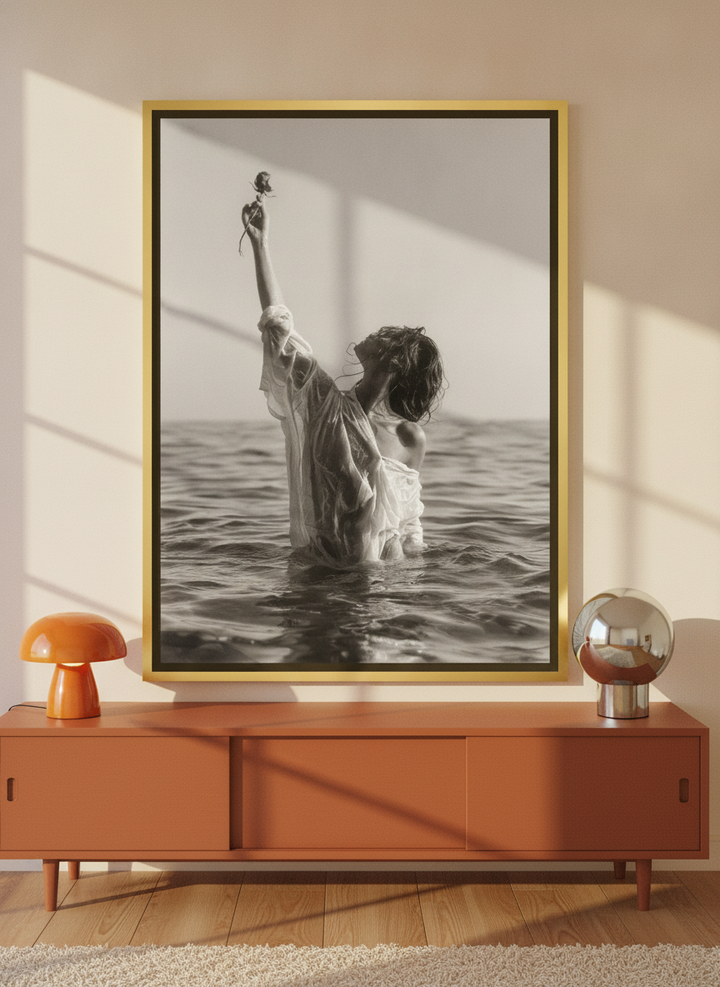Canvas wall art with a gold leaf surround standing on a sideboard in a retro 70s bedroom