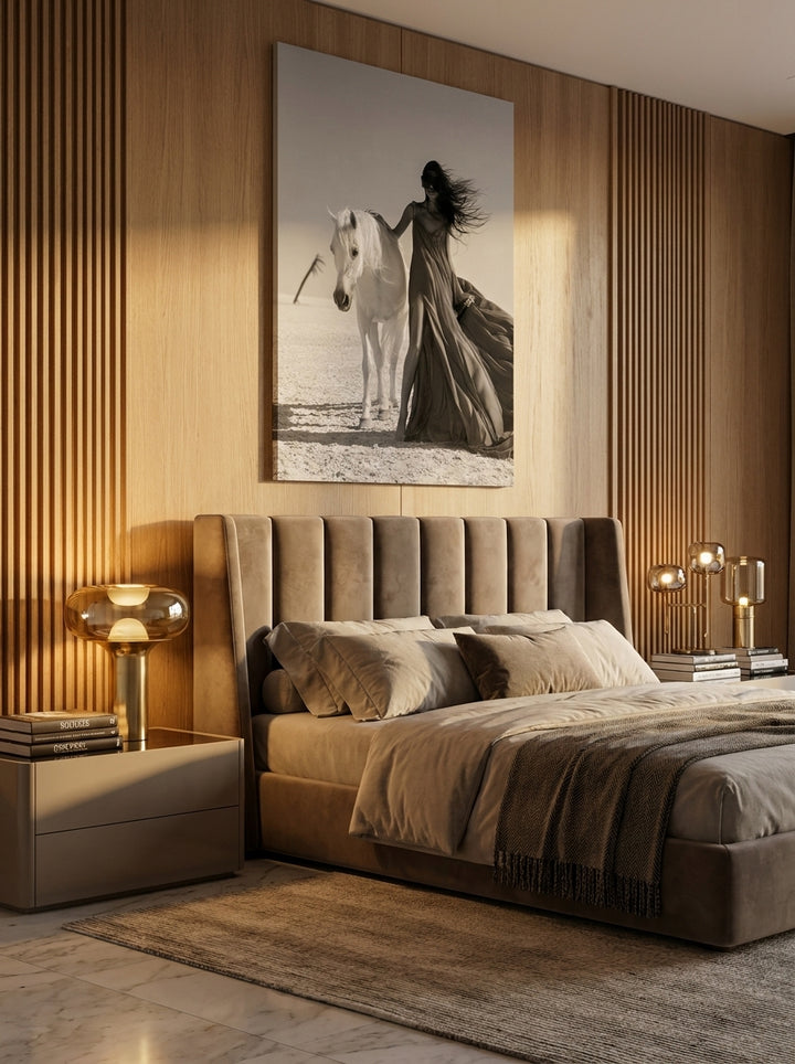 Stretched canvas wall art styled on the wall in a luxe bedroom