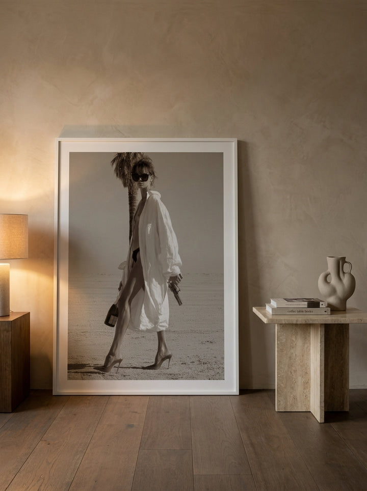 Oversized statement modern wall art print leaning against the wall in a luxe living room