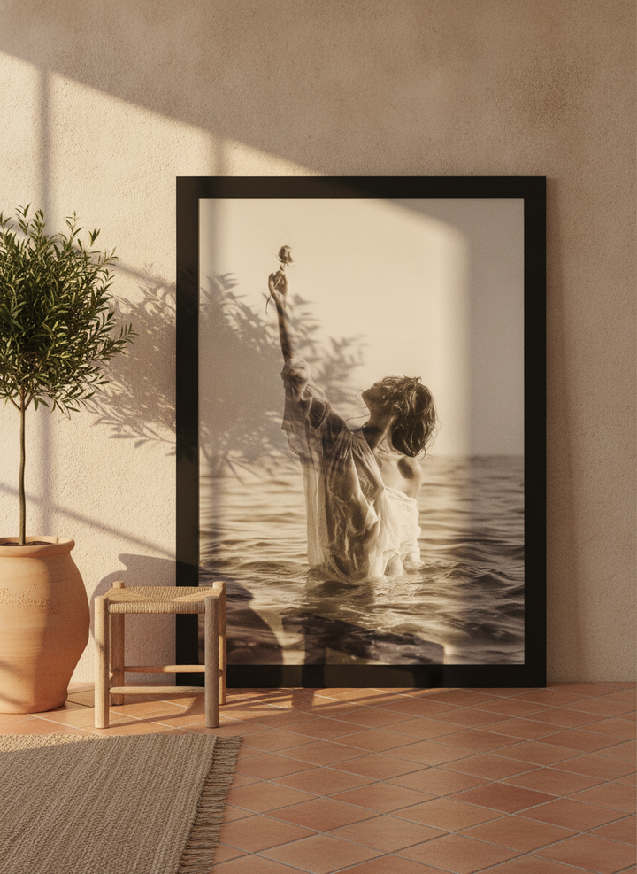 Oversized statement modern wall art print leaning against the wall in a Mediterranean bathroom
