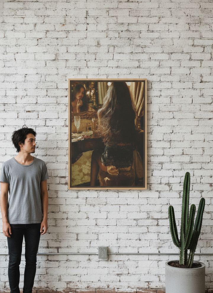 Person holding canvas wall art with a natural timber surround in an industrial loft living room