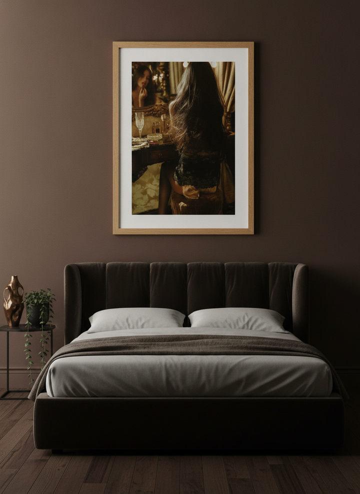 Modern wall art print styled on the wall in a moody bedroom