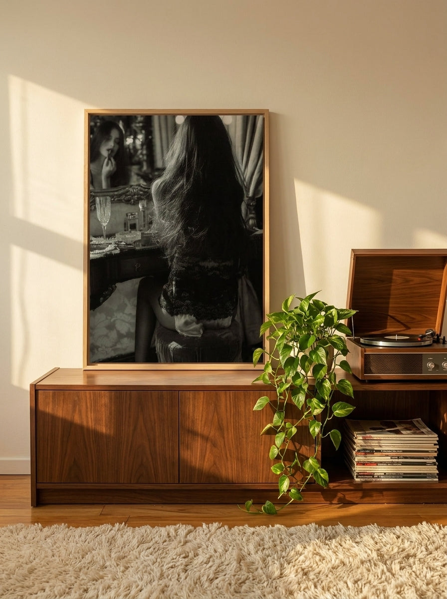 Canvas wall art with a natural timber surround standing on a sideboard in a retro 70s living room