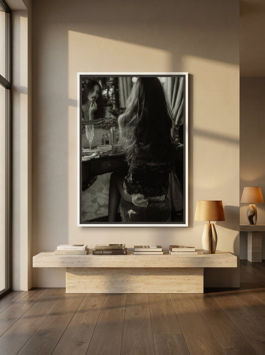 Oversized statement canvas wall art with a white surround styled on the wall in a luxe living room