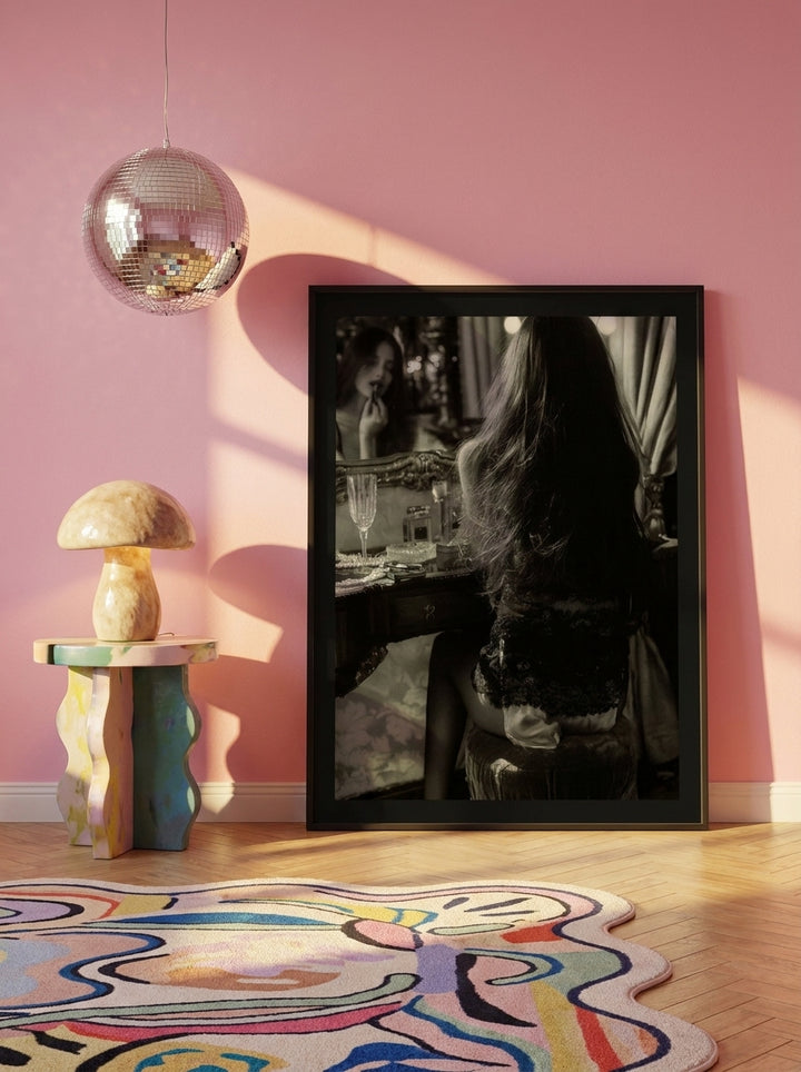 Modern wall art print leaning against the wall in a colourful eclectic bedroom