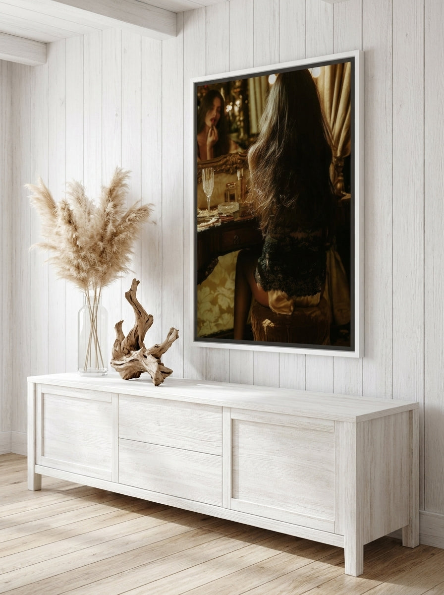 Canvas wall art with a white surround styled on the wall in a coastal living room