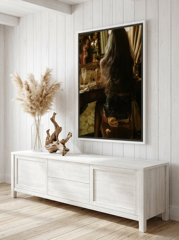 Canvas wall art with a white surround styled on the wall in a coastal living room