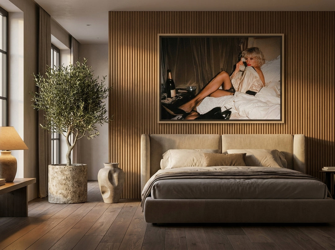 Oversized statement canvas wall art with a natural timber surround styled on the wall in a luxe bedroom