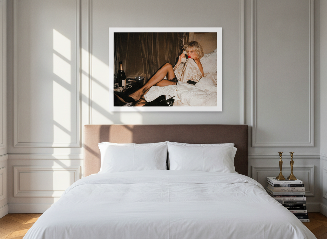 Modern wall art print styled on the wall in a Parisian bedroom