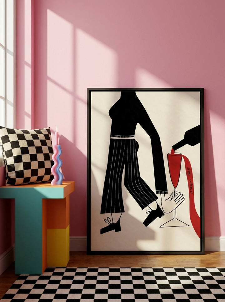 Canvas wall art with a black surround leaning against the wall in a colourful eclectic bedroom
