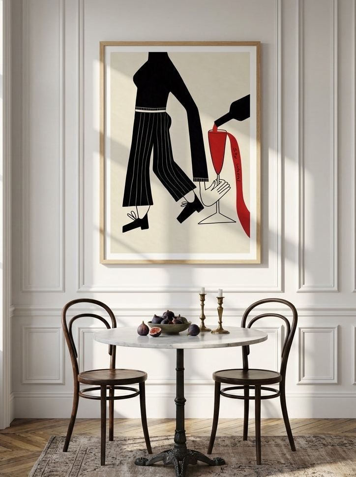 Modern wall art print styled on the wall in a Parisian dining room
