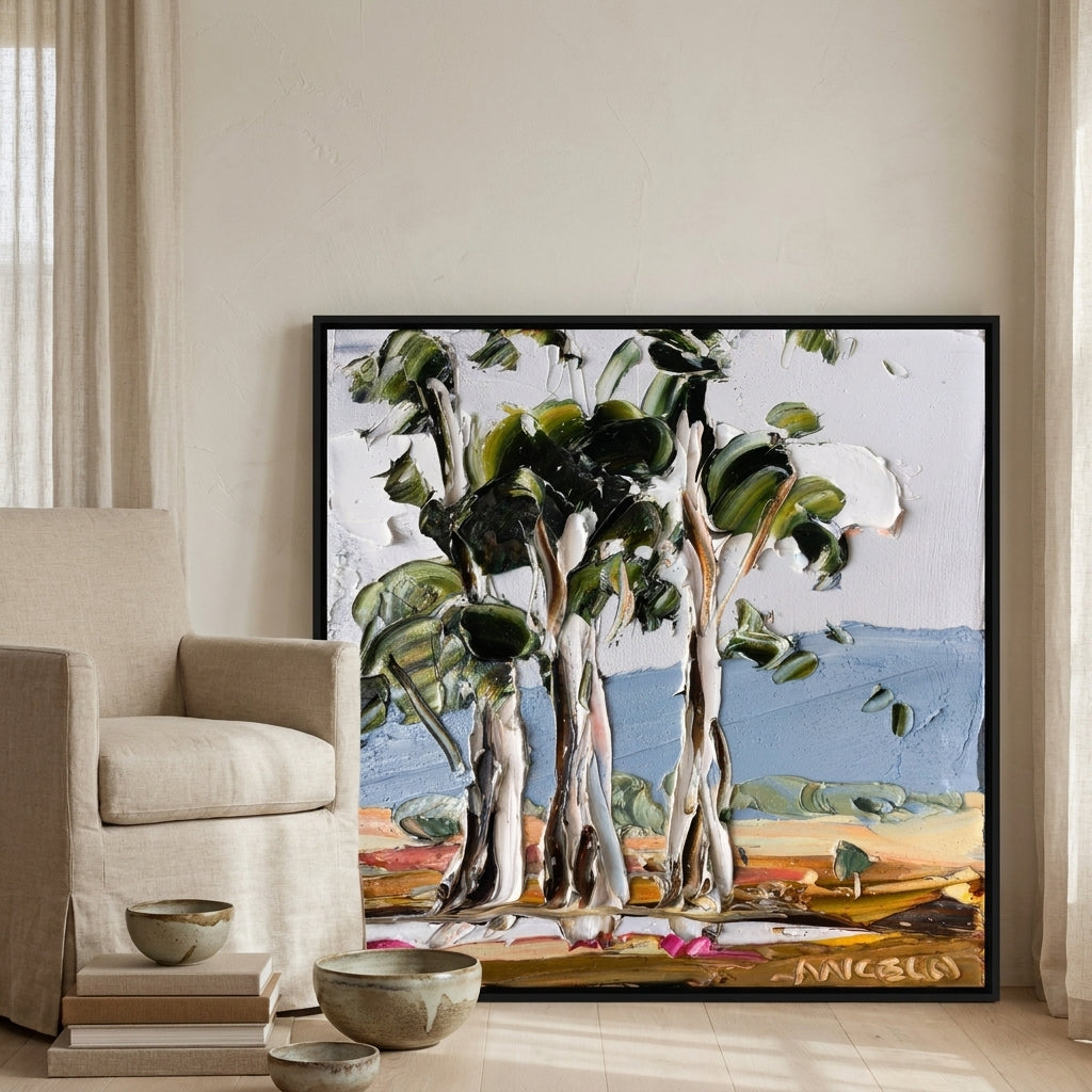 Canvas wall art with a black surround leaning against the wall in a warm Japandi home office