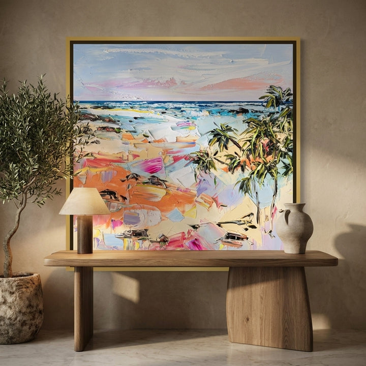 Canvas wall art with a gold leaf surround styled on the wall in a luxe home office