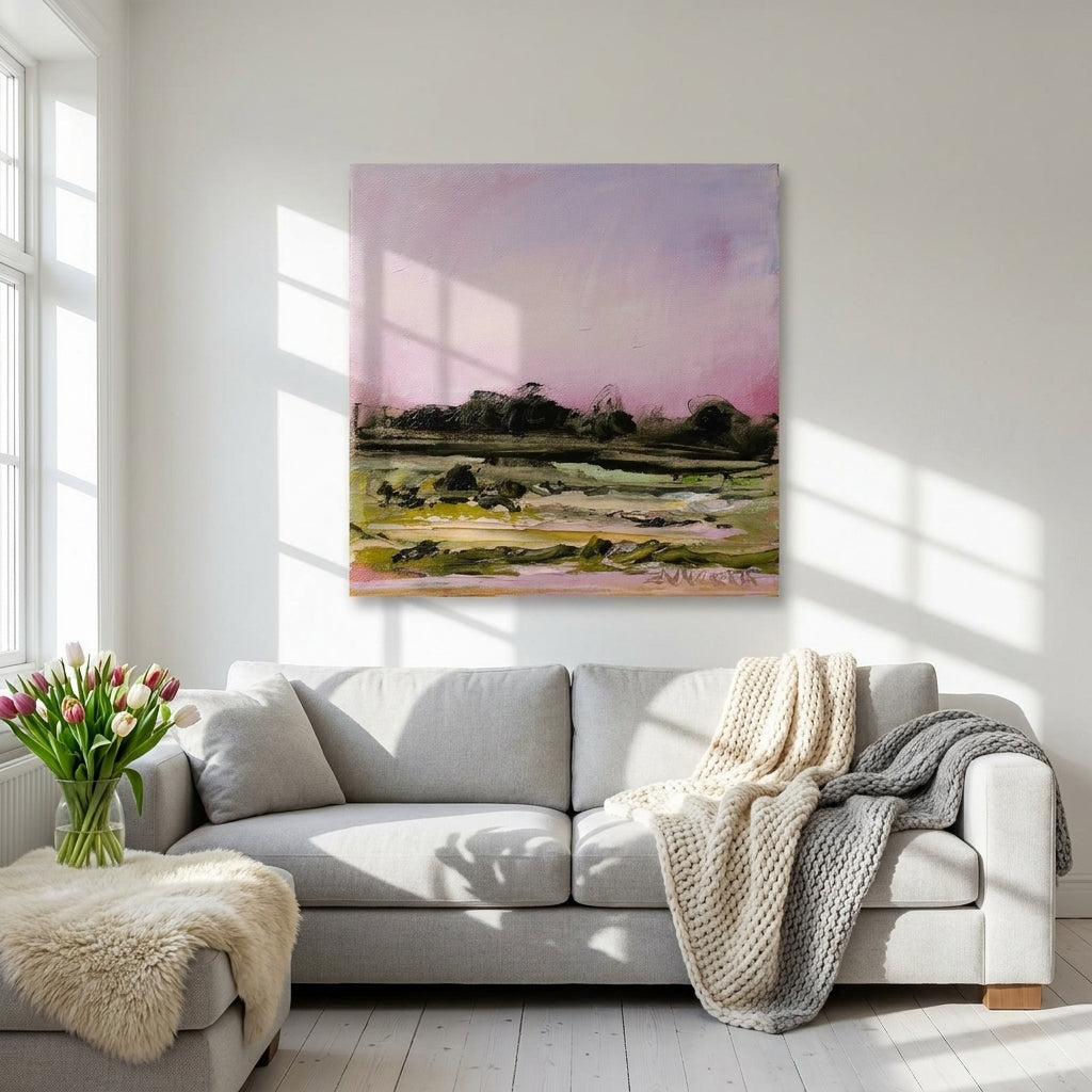 Stretched canvas wall art styled on the wall in a bright Scandinavian living room