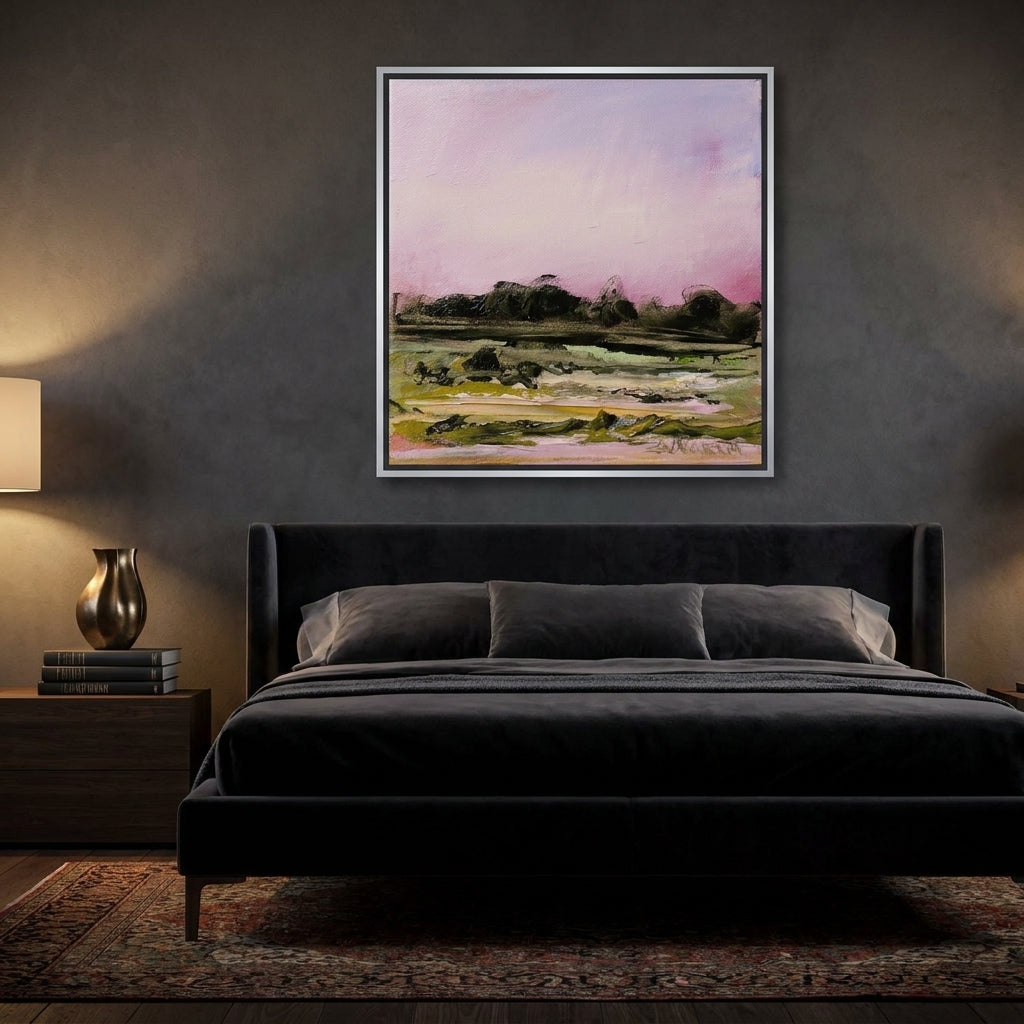 Canvas wall art with a silver leaf surround styled on the wall in a moody bedroom