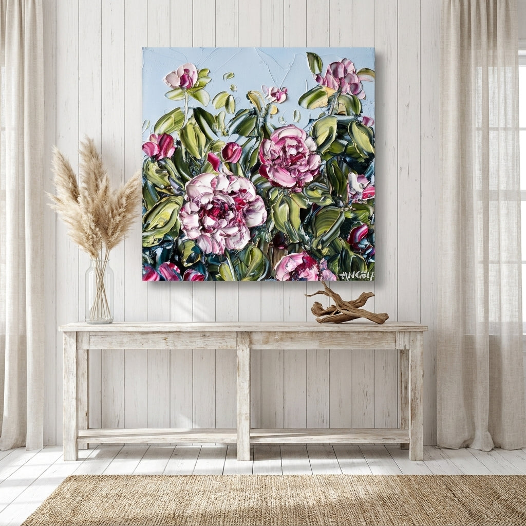 Stretched canvas wall art styled on the wall in a coastal living room
