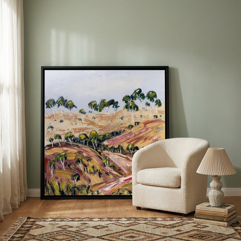 Oversized statement canvas wall art with a black surround leaning against the wall in a mid-century dining room