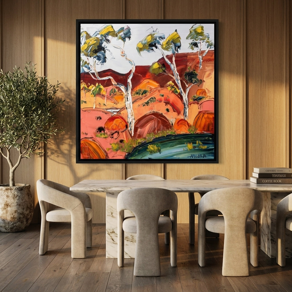 Oversized statement canvas wall art with a black surround styled on the wall in a luxe dining room
