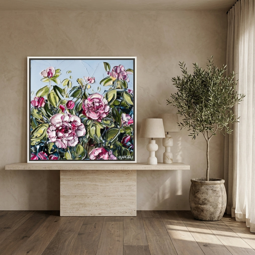 Canvas wall art with a white surround standing on a console in a luxe dining room