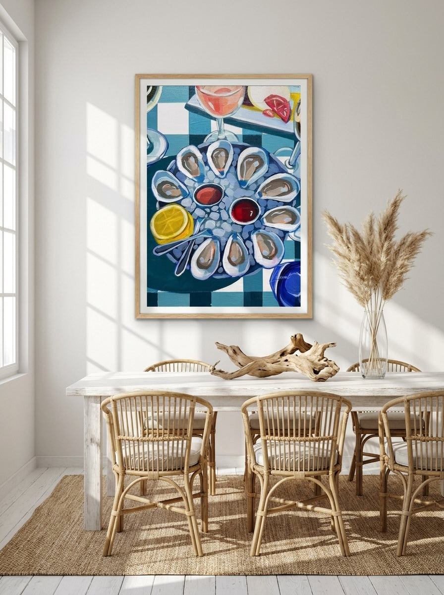 Modern wall art print styled on the wall in a coastal dining room