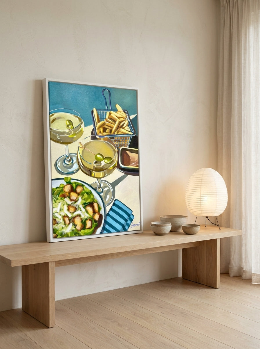 Canvas wall art with a white surround standing on a kitchen bench in a warm Japandi kitchen