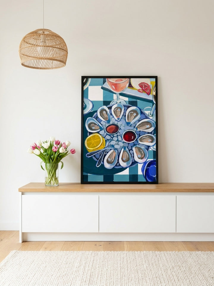 Modern wall art print standing on a kitchen bench in a bright Scandinavian kitchen