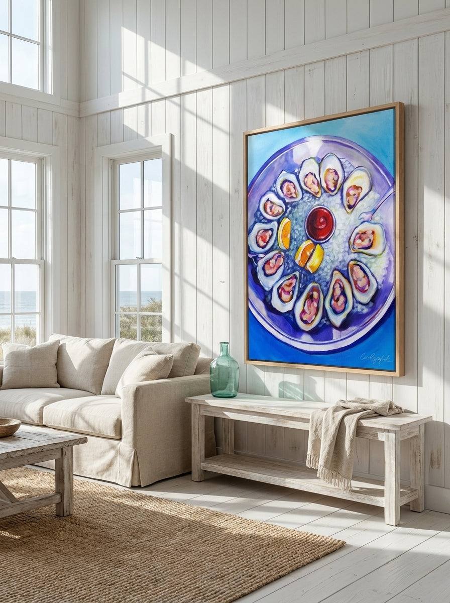 Oversized statement canvas wall art with a natural timber surround styled on the wall in a coastal living room