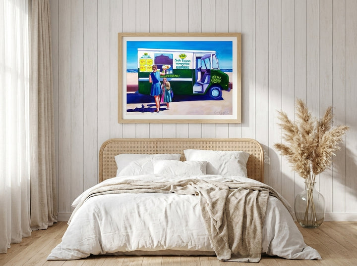 Modern wall art print styled on the wall in a coastal bedroom