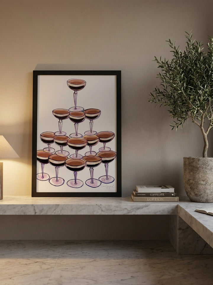 Modern wall art print standing on a kitchen bench in a luxe kitchen