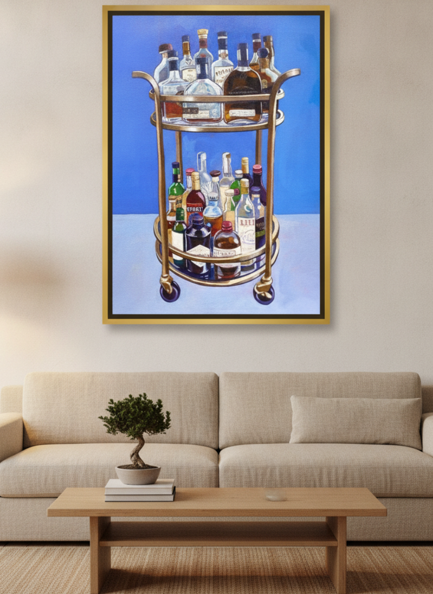 Oversized statement canvas wall art with a gold leaf surround styled on the wall in a warm Japandi living room