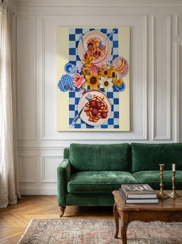 Stretched canvas wall art styled on the wall in a Parisian living room