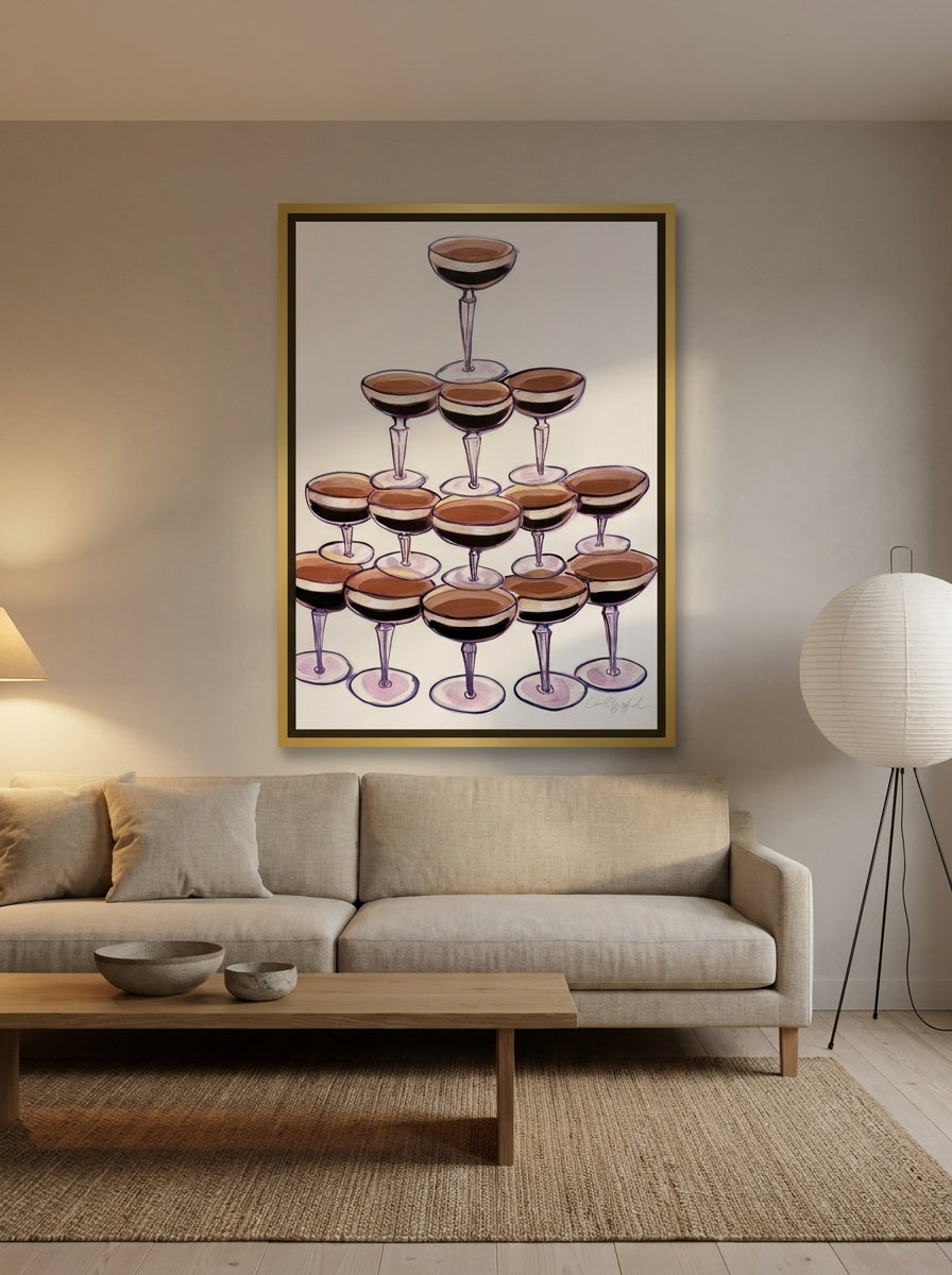 Oversized statement canvas wall art with a gold leaf surround styled on the wall in a warm Japandi living room