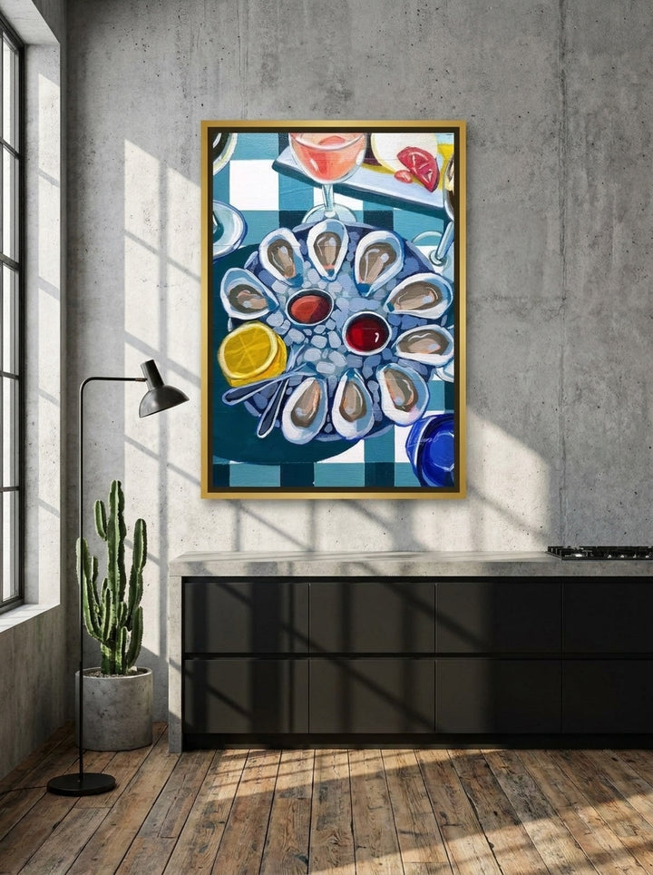 Canvas wall art with a gold leaf surround styled on the wall in an industrial loft kitchen