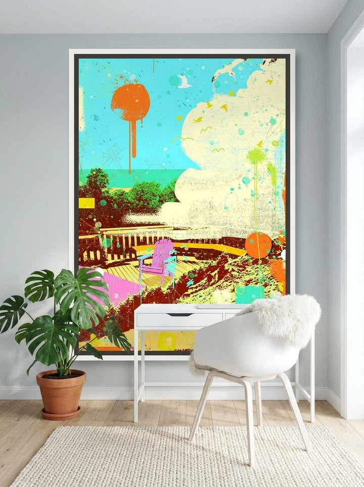Canvas wall art with a white surround styled on the wall in a bright Scandinavian home office