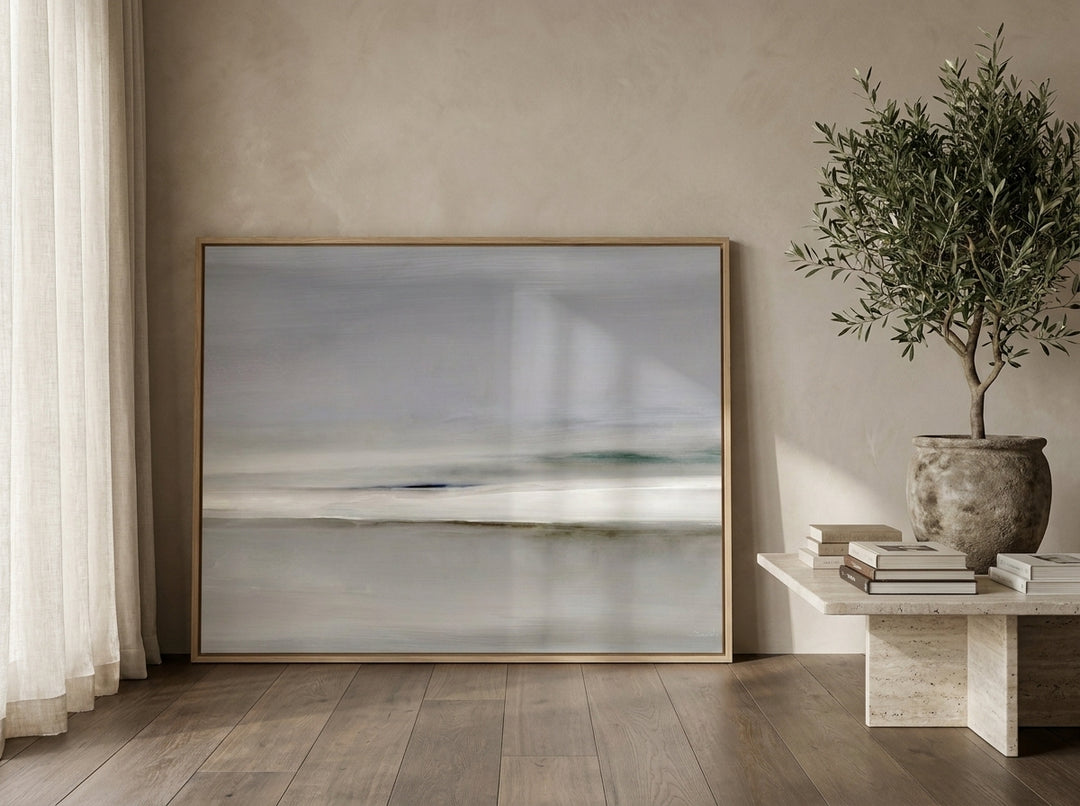 Oversized statement modern wall art print leaning against the wall in a luxe bedroom