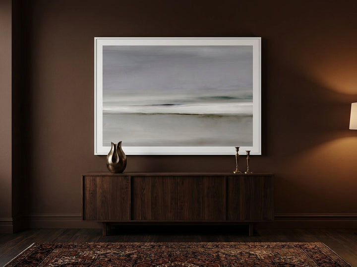 Oversized statement modern wall art print styled on the wall in a moody living room