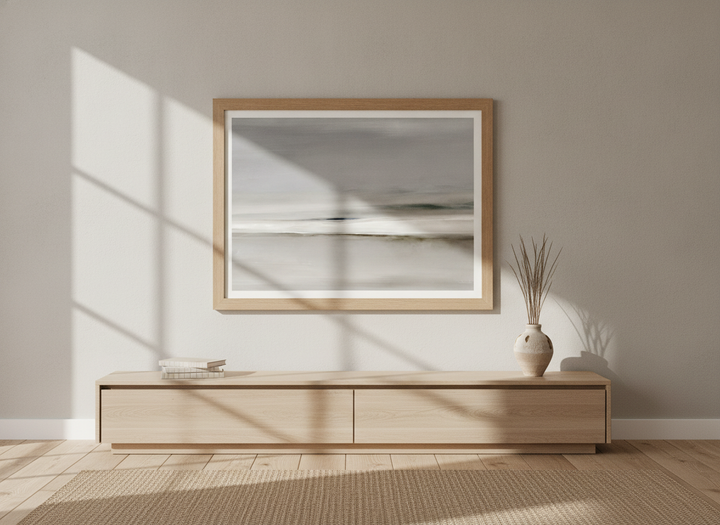 Modern wall art print styled on the wall in a warm Japandi living room