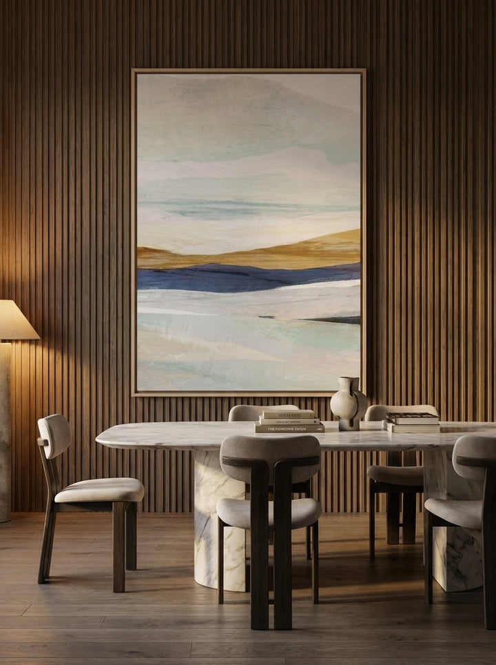 Oversized statement canvas wall art with a natural timber surround styled on the wall in a luxe dining room