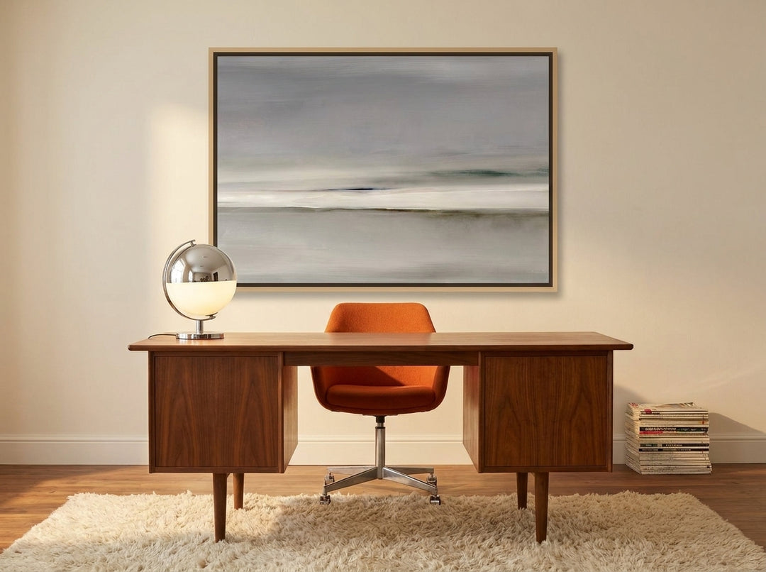 Canvas wall art with a natural timber surround styled on the wall in a retro 70s home office